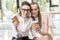 Portrait lesbian couple drinking coffee together