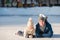 Portrait of little adorable girl and young father skating