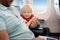 Portrait of little boy with his father during traveling by an airplane