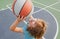 Portrait of little boy play basketball. Concept of kids sports.