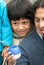 Portrait little boy wiht father in the street