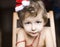 Portrait of little cute boyl with Christmas tree in hat