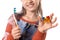 Portrait of a little cute girl with toothbrush and orthodontic appliance on white background