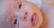 portrait of a little cute newborn baby with a curious look.extremely close-up