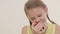 Portrait of little girl biting apple