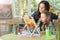 Portrait of little girl with mother using abacus