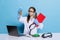 Portrait of little school girl, kid in white big gown as chemist, scientist chemical equipment, fluid in laboratory