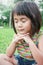 Portrait of little young asian girl praying