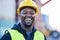 Portrait, logistics and black man smile with helmet or hard hat at shipyard and confident at work. Shipping, business