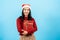 portrait, Long-haired Asian girl in red long-sleeved top wearing christmas hats, took the thrown gift box,