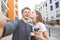 Portrait of a lovers of a young couple takes selfie on the street of the town