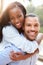 Portrait Of Loving African American Couple In Countryside