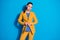 Portrait of magnificent lovely pretty chief girl adjust button blazer prepare business lawyer meeting wear yellow pants