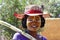 Portrait of malagasy woman with tradytional mask on the face