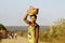 Portrait of malagasy woman with tradytional mask on the face