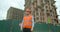 Portrait of male builders engineers contractor worker foreman architect in hard hat on background of building under