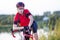 Portrait of Male Cyclist Having a Rest and Posing on The Bike.