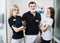 Portrait of male dentist and two female assistants in dental office