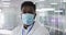 Portrait of male doctor wearing face mask in hospital