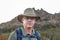 Portrait of male explorer wearing hat and eyeglasses