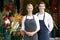 Portrait Of Male And Female Florist Outside Shop