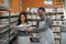 Portrait of male and female potter holding ceramic plates