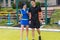 Portrait of male and female tennis players