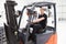 Portrait Of Male Fork Lift Truck Driver In Factory