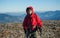 Portrait of male hiker on the top of the mountain