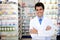 Portrait of a male pharmacist at pharmacy