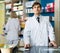 Portrait of male pharmacists working in modern farmacy