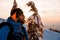 portrait of a male skier on the background of a winter landscape