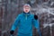 Portrait of male skier on blurred background