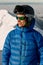 portrait of male skier in jacket and helmet on his head and sunglasses on his face