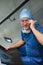 Portrait of male surgeon examine x-ray on stairs