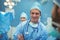 Portrait of male surgeon smiling in operation theater