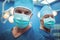 Portrait of male surgeons wearing surgical mask in operation theater