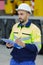 Portrait male worker with clipboard