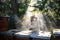 Portrait of man beekeeper working in apiary, using bee smoker.