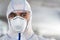 Portrait of man in coronavirus hazmat, mask and glasses