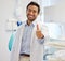 Portrait, man and dentist with thumbs up, smile and oral care with happiness, specialist and professional. Face, male