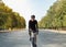 Portrait of a man on a gravel bike on the road.