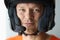 Portrait of man in helmet with microphone for hands-free communication closeup