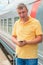 Portrait of a man on a journey on train