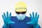 Portrait of a man in a medical mask with raised hands in protective gloves. clean hands and quarantine
