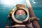 Portrait of man in old diving suit and helmet