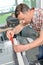 Portrait man repairing photocopier