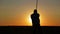 Portrait of a man with a sword at sunset, the path of a warrior. Samurai yakuza with a sword at sunset of the day.