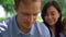 Portrait man watching tablet on picnic closeup. Family rest with modern gadget.