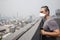 Portrait of man wearing facial hygienic mask outdoors. Ecology, air pollution, Environmental awareness and virus protection concep